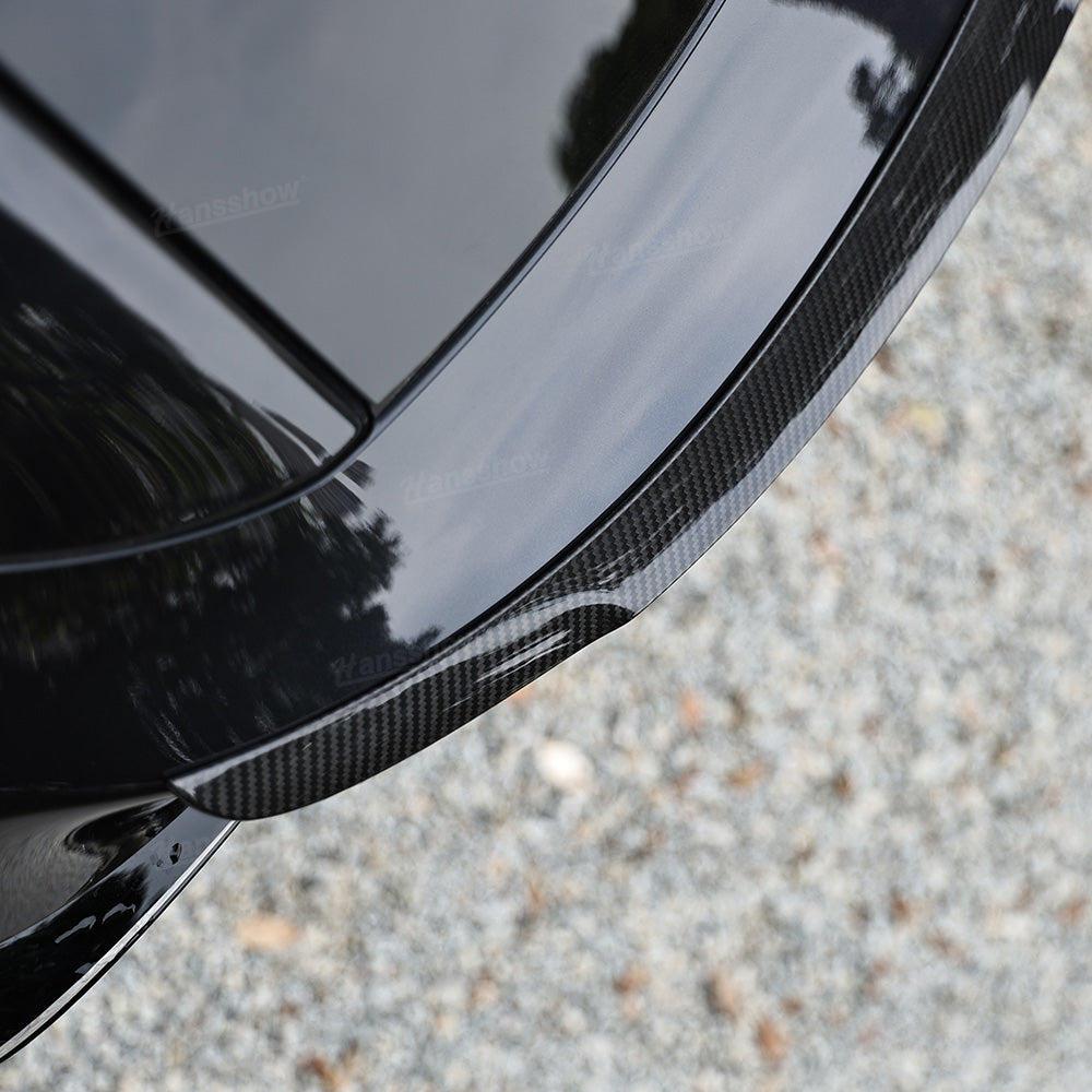 Model 3/Y Real Carbon Fiber Rear Trunk Lip Spoiler in a showroom