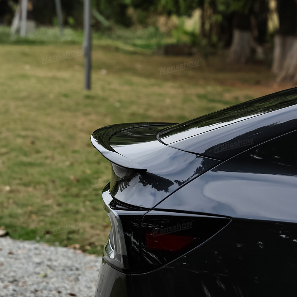 Model 3/Y Real Carbon Fiber Rear Trunk Lip Spoiler with a measuring tape