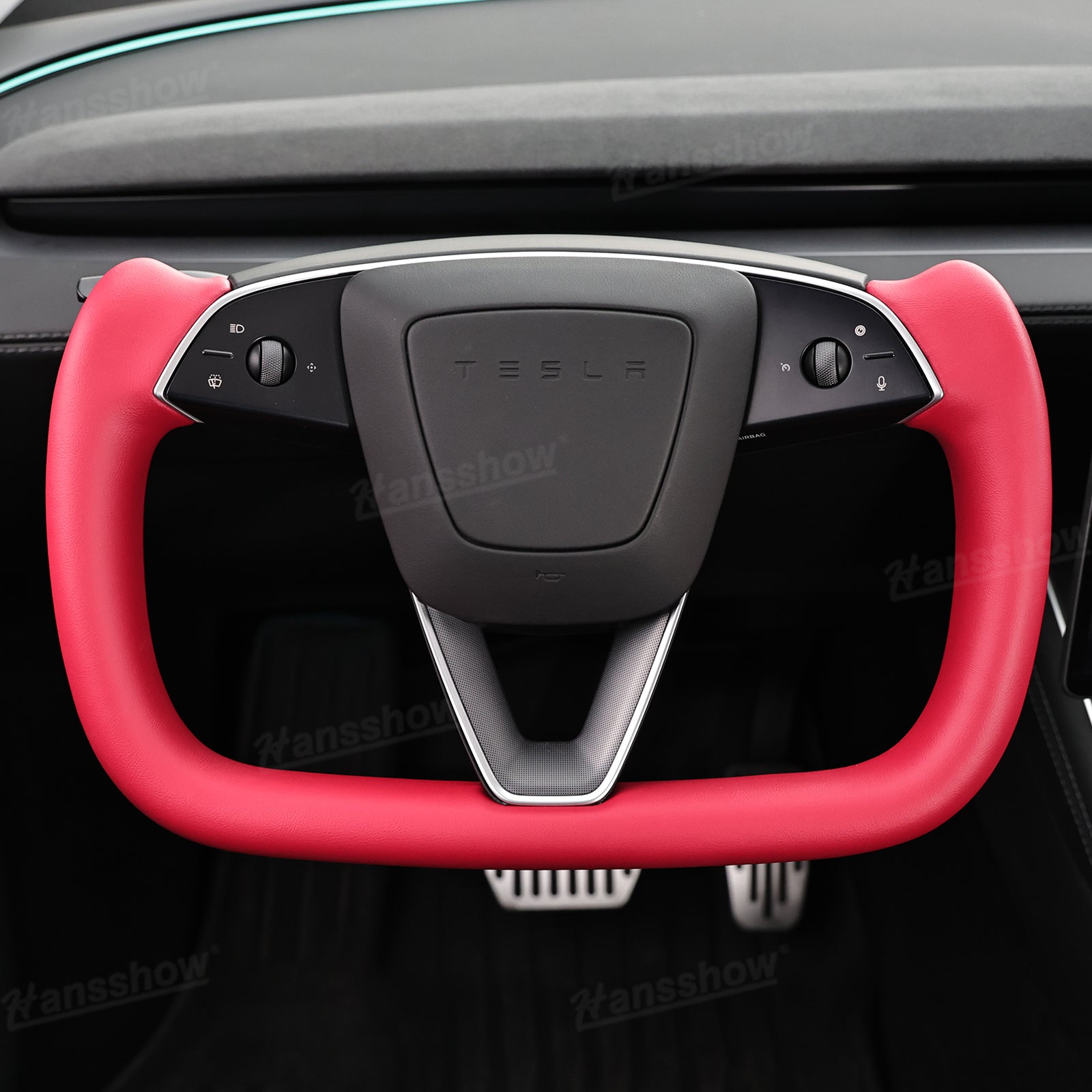 Side angle of Model Y Juniper Yoke Steering Wheel with carbon accents