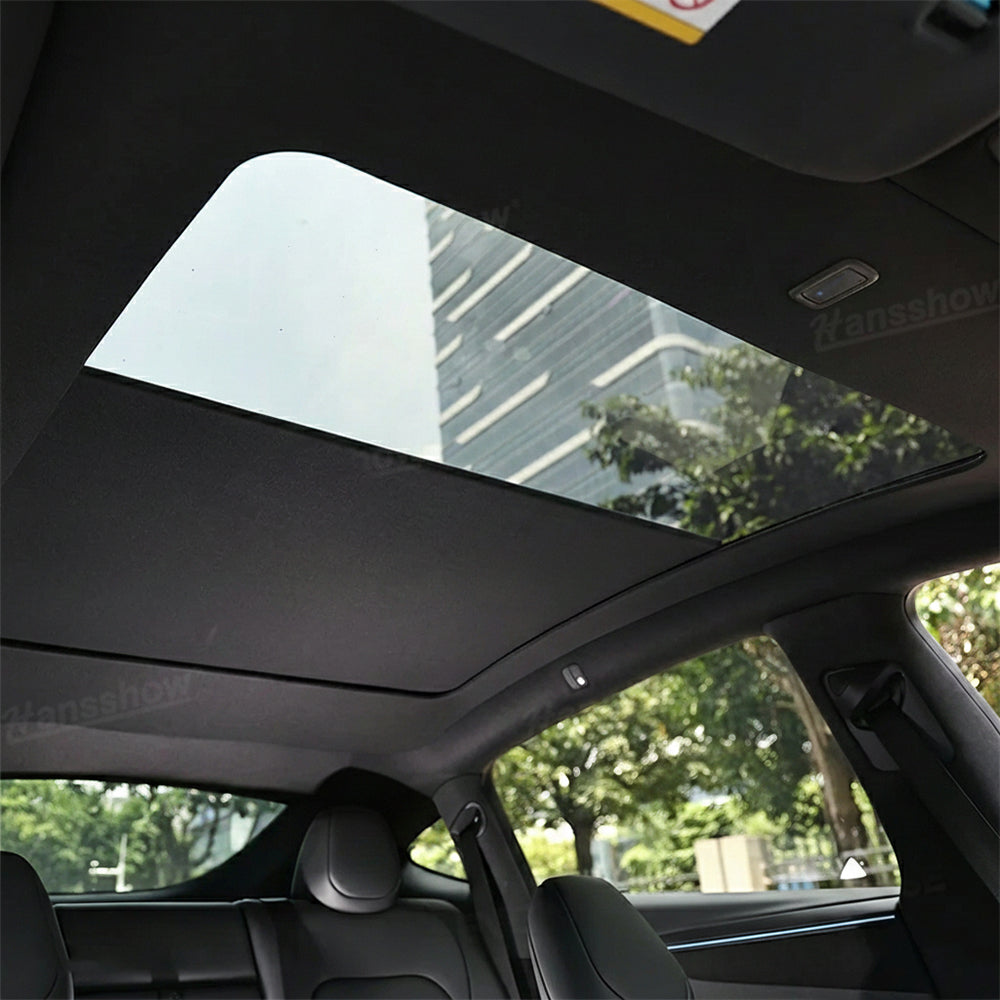 Model Y Juniper Power Sunshade with Tesla logo in background