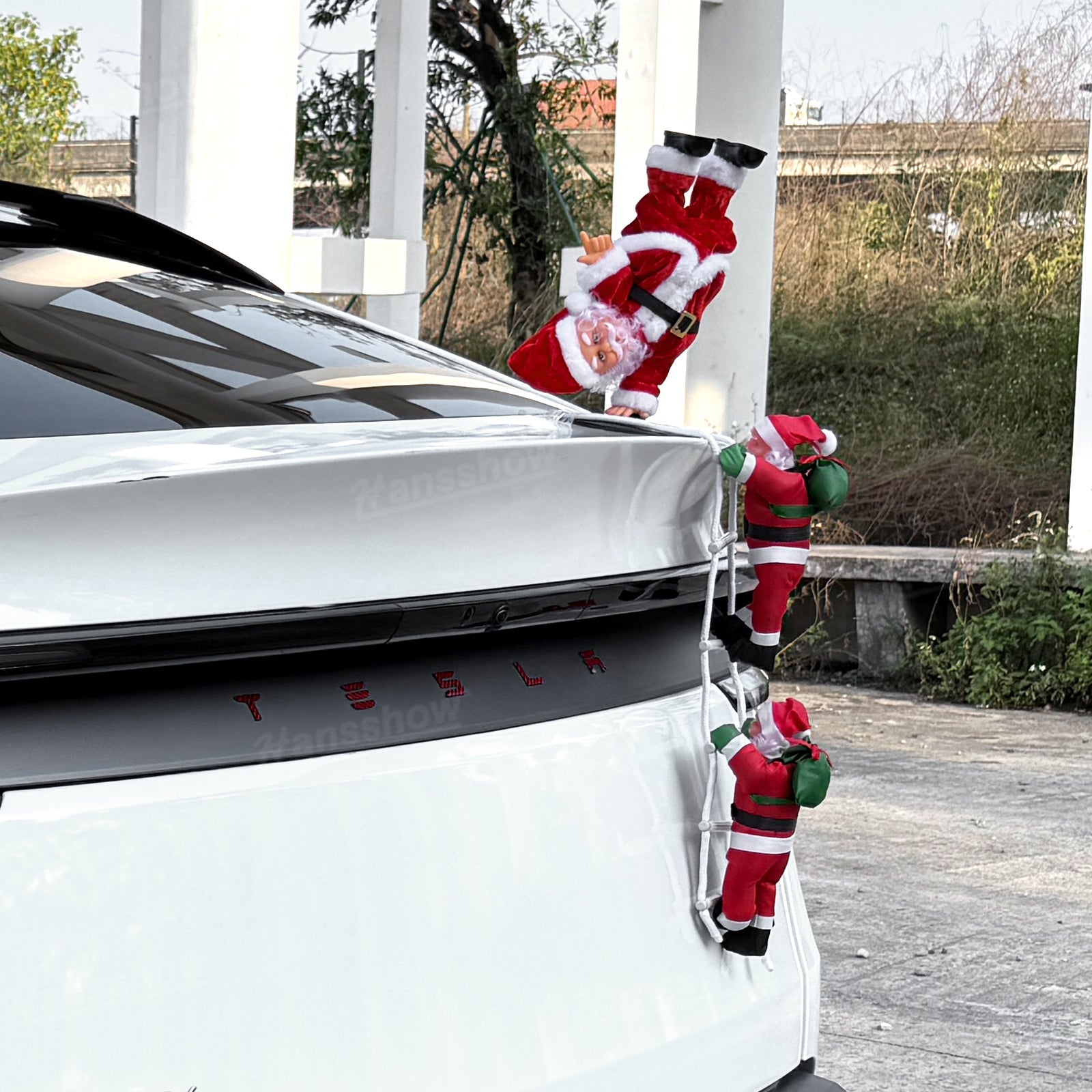 Climbing Santa Claus Decoration for Tesla Model Y in winter setting