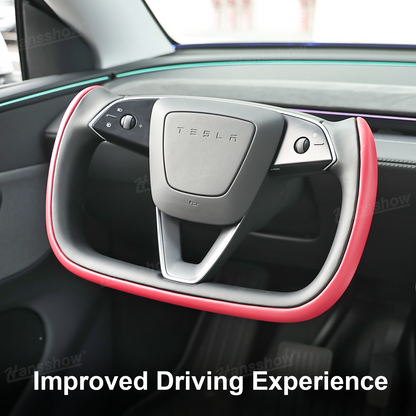 Model 3 Highland/Y Juniper Two-Tone Yoke Steering Wheel close-up of leather
