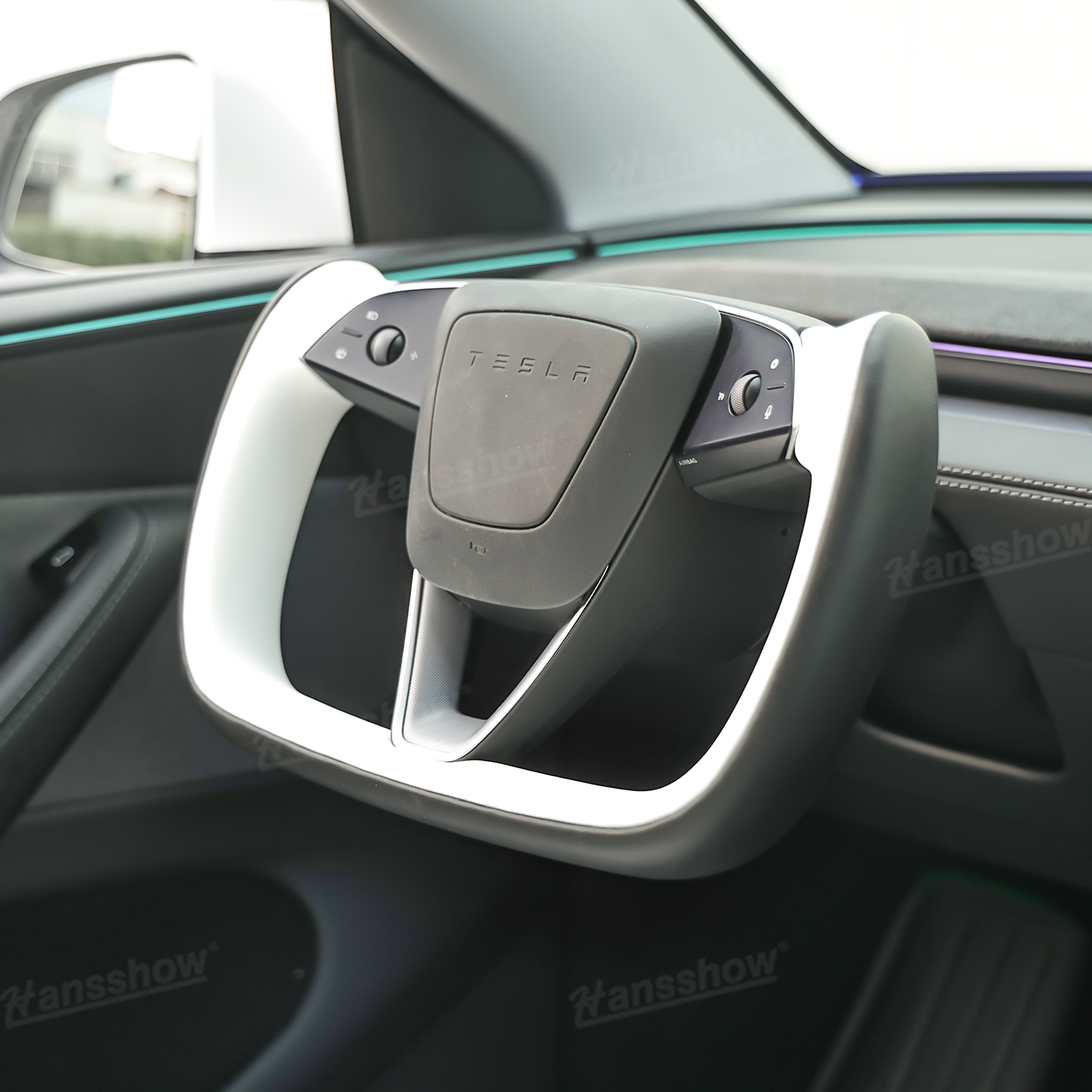 Model 3 Highland/Y Juniper Two-Tone Yoke Steering Wheel side angle
