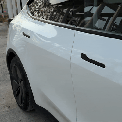 Model Y Juniper Electric Door Handle showing pop-out feature