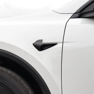 Model Y Juniper Carbon Fiber Side Mirror Covers on road