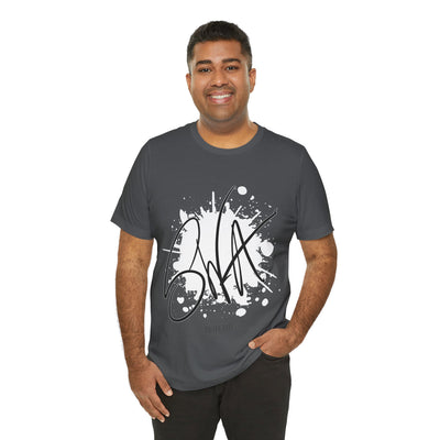 SWA Signature Splash Tee in asphalt color on table