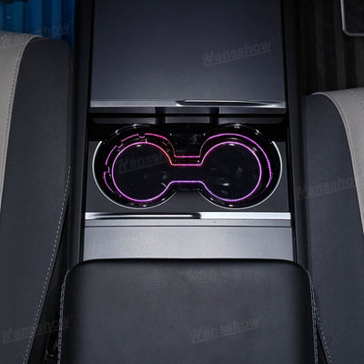 Model Y Juniper Center Console Cup Holder with Ambient Light - Charging Ports in Use