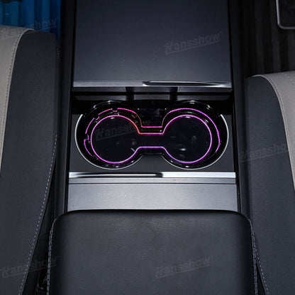 Model Y Juniper Center Console Cup Holder with Ambient Light - Charging Ports in Use