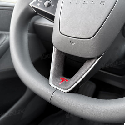 Model Y Juniper Alcantara Trim Cover next to original steering wheel