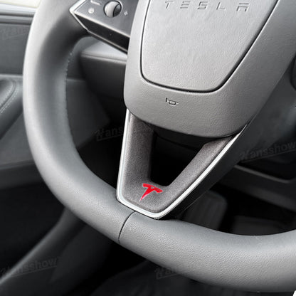 Model Y Juniper Alcantara Trim Cover next to original steering wheel