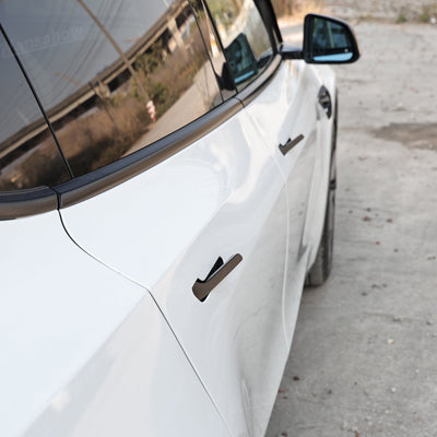 Model Y Juniper Electric Door Handle in different lighting