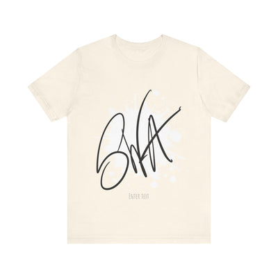 SWA Signature Splash Tee on table in red