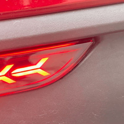 Model Y Rear Bumper Tail Light comparison with standard reflector