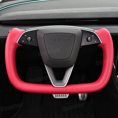 Side angle of Model Y Juniper Yoke Steering Wheel with carbon accents