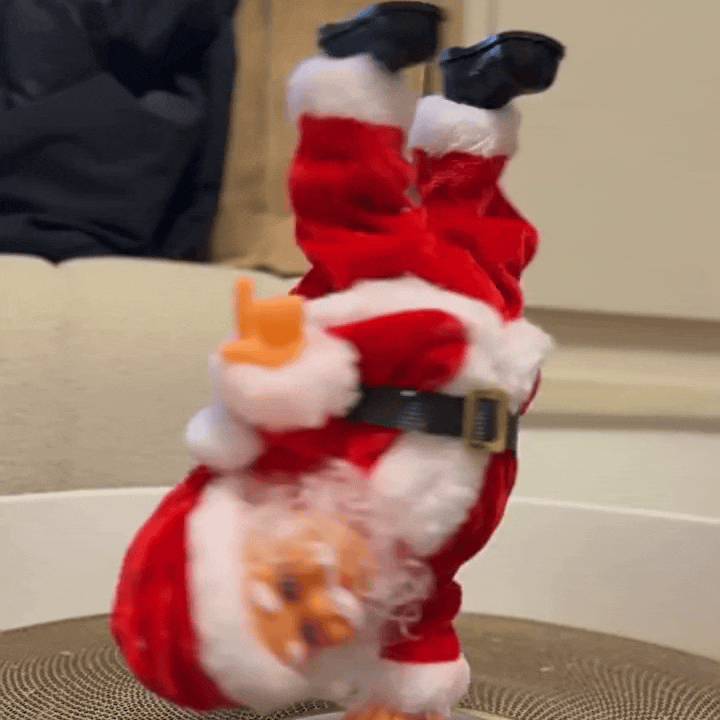Close-up of Santa Claus dancing in Tesla trunk decoration