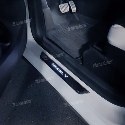 Model Y Juniper LED illuminated Welcome Pedal Door Sill Protector Hansshow - illuminated at night
