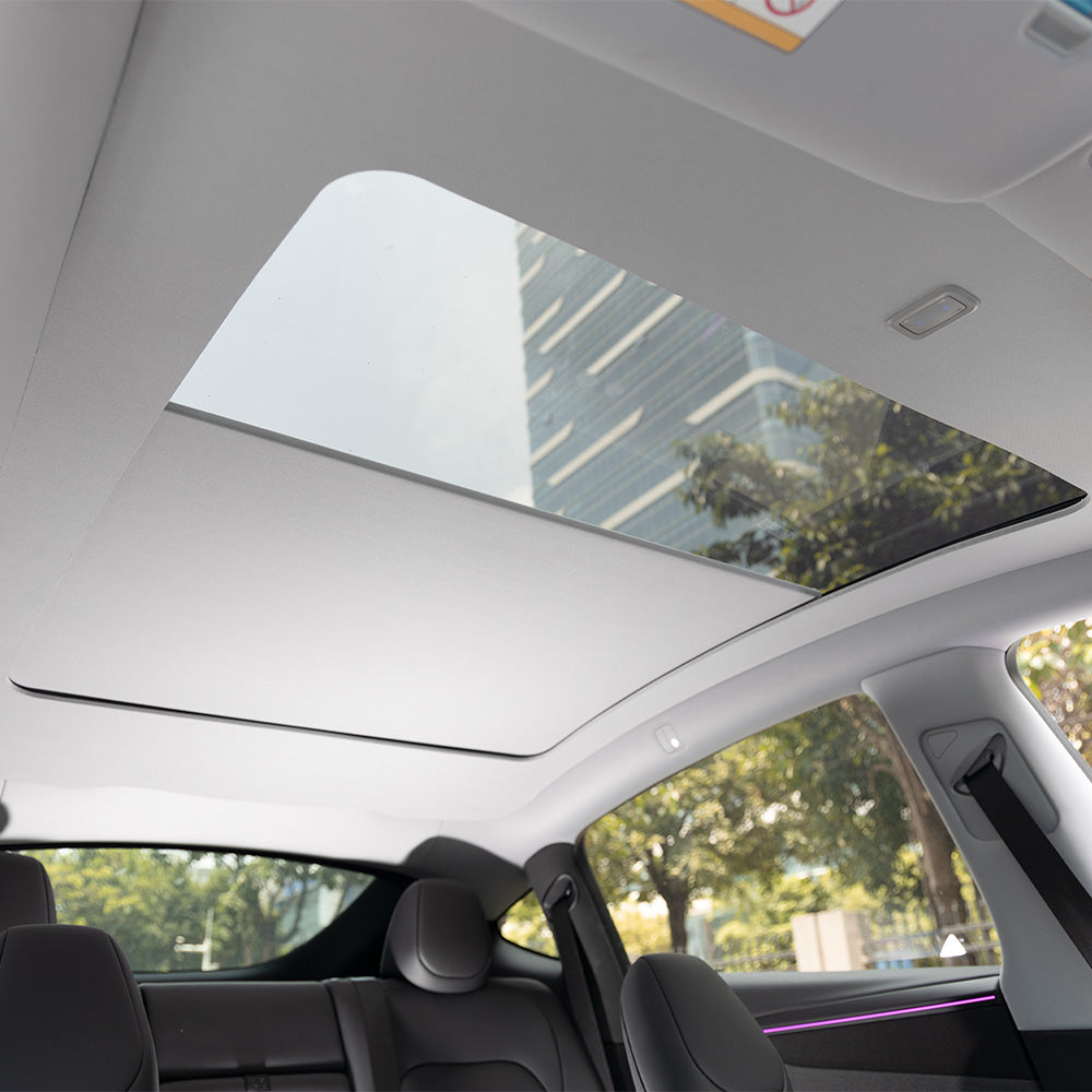 Model Y Juniper Power Sunshade highlighting voice command use