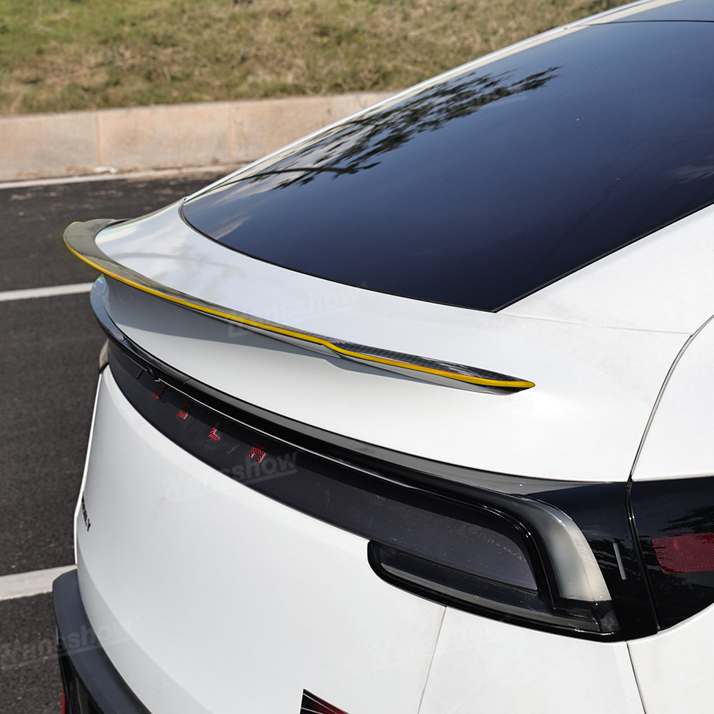 Detailed view of carbon fiber texture on Model Y Juniper Spoiler