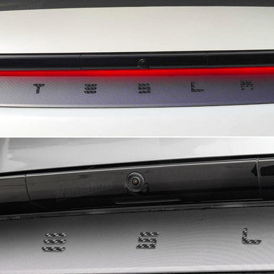 Model Y Juniper Carbon Fiber Emblem side angle view