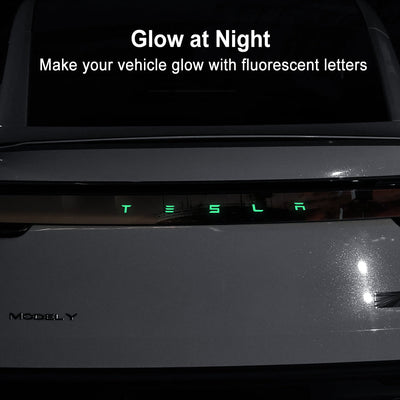 Model Y Juniper Fluorescent Vinyl Decal T-E-S-L-A Lettering Tailgate Overlay installed on tailgate