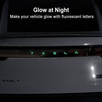 Model Y Juniper Fluorescent Vinyl Decal T-E-S-L-A Lettering Tailgate Overlay installed on tailgate