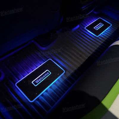 Model Y Juniper LED Floor Mat Lights with Tesla Logo - close-up of logo illumination