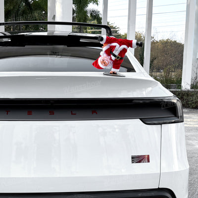 Santa Claus performing spins in Tesla Model Y trunk