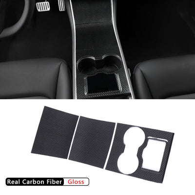 Model 3/Y Carbon Fiber Center Console Trim next to Tesla Model Y key