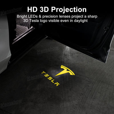 Close-up of 64-Color Changing Puddle Lights projecting Tesla T logo