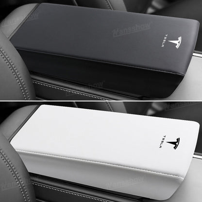 Model Y Juniper Armrest Cover on console with natural lighting