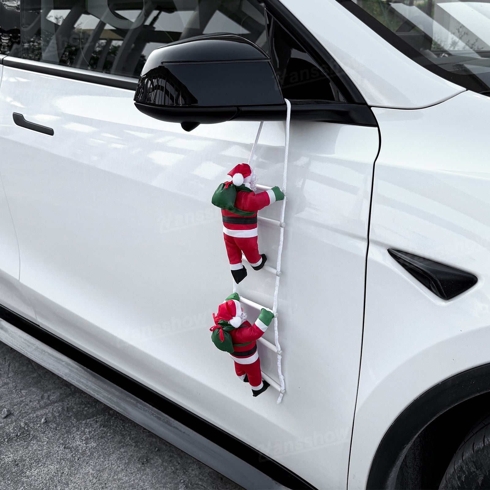 Climbing Santa Claus Decoration for Tesla Model Y in park