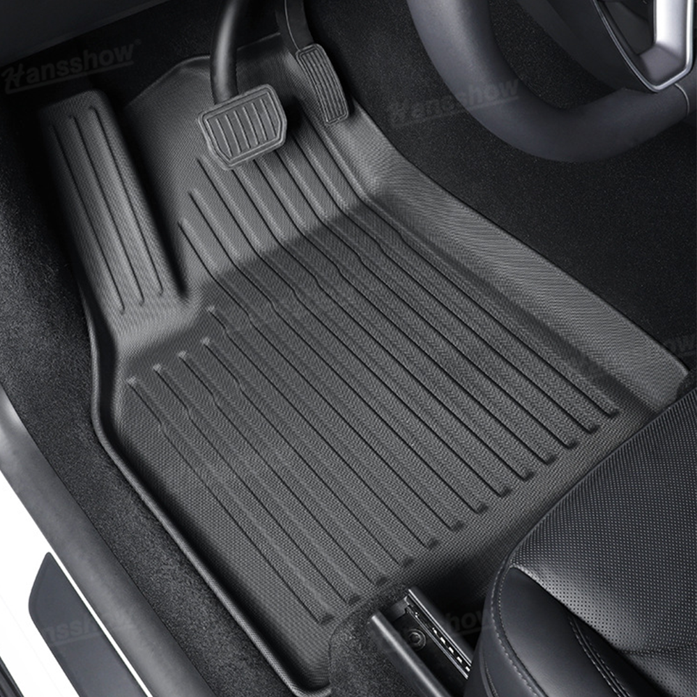 Model Y Juniper Floor Mats during installation process