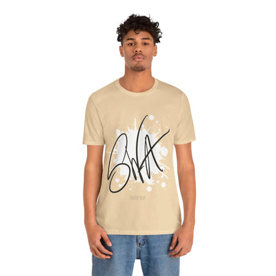 SWA Signature Splash Tee in soft cream color on display