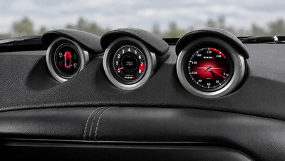 Digital triple gauges installed in the Nissan 370Z factory gauge pods